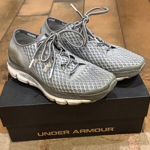 Under Armour women’s and men’s Athletic Gray Sneakers